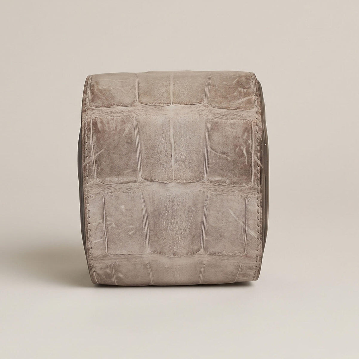 Back panel of the luxury watch travel case showcasing the symmetrical un-dyed bone-to-grey gradient of matte Himalayan crocodile hide.
