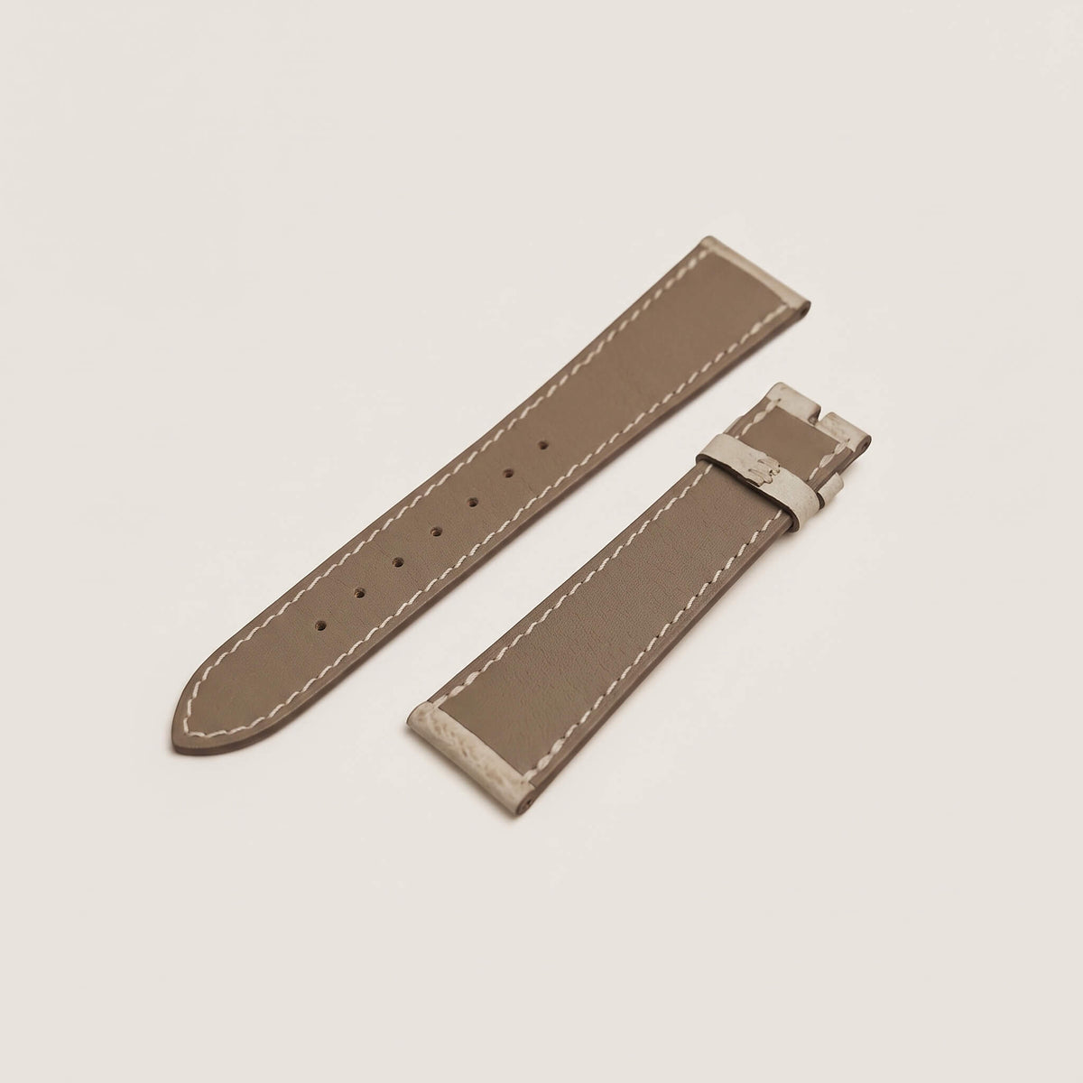 Back view of the luxury watch strap lined with genuine water-resistant French Haas Zermatt calfskin in light taupe with contrasting hand stitching.