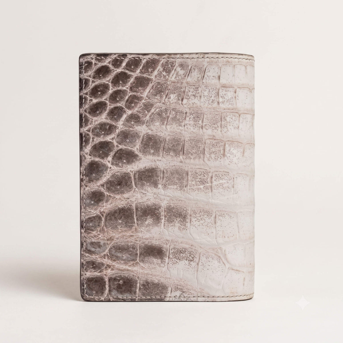 Back exterior panel of the luxury dual passport cover highlighting the organic scale pattern of un-dyed matte French Himalayan crocodile hide.