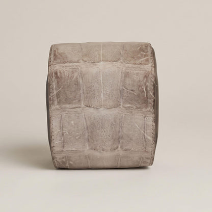 Back panel of the luxury watch travel case showcasing the symmetrical un-dyed bone-to-grey gradient of matte Himalayan crocodile hide.